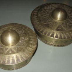 Brass gongs used as a main melodic instrument in the kulintang ensemble