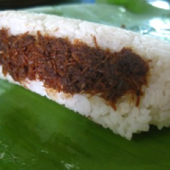 Pastil, a Maguindanao delicacy made of rice and adobo wrapped in banana leaves